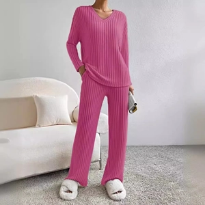 Pink two-piece knit loungewear set with V-neck long sleeve top and wide leg pants