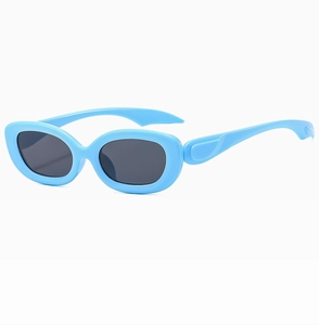 Macro detail of sky blue vintage oval sunglasses with dark lenses and retro Y2K frame