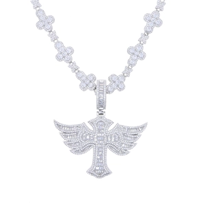 Detailed view of silver cross wing pendant with shimmering pavé set cubic zirconia stones