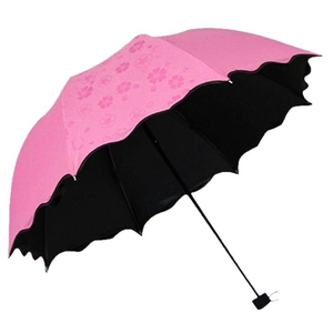 Pink folding umbrella with magic flower pattern, black UV coating, and ruffled edges