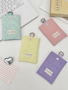 Quilted heart card holder in pastel colors with snap button and D-ring attachment