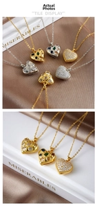Detailed view of openable heart locket necklaces with colorful zircon stones on silk fabric
