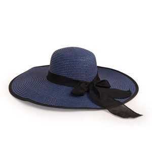 Close-up of woven straw sun hat with wide brim, navy blue texture and large black ribbon bow