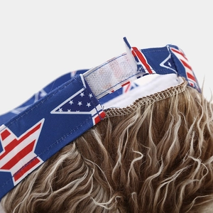 Detail of adjustable velcro strap and brown curly wig hair on US flag baseball cap