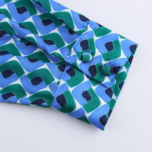 Chemisier à manches longues aux motifs géométriques avec poignets boutonnés élégants