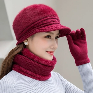 Detail of burgundy winter knit hat set with soft fleece lining and thick scarf