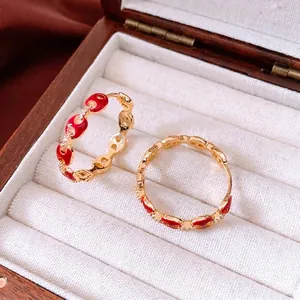 Luxury 18k gold plated link earrings with red enamel and zircon accents in a gift box