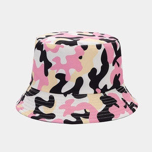 Detailed view of pink camouflage pattern cotton fabric and stitching on fisherman hat