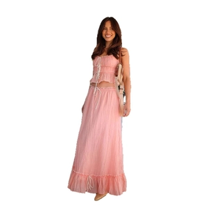Pink two-piece summer set with drawstring crop top and high waist pleated maxi skirt for women
