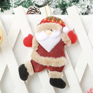 Detailed view of Santa Claus fabric ornament hanging on a white wooden fence decoration