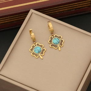 Exquisite gold stainless steel clover earrings with turquoise beads on jewelry box