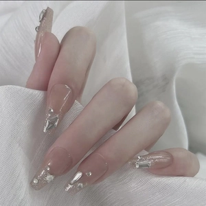 Sparkling bridal press-on nails with nude gradient and high-shine rhinestone crystals