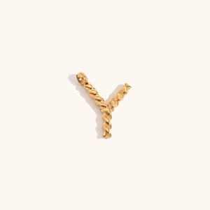 Macro detail of 18K gold plated letter Y pendant with twisted rope texture design