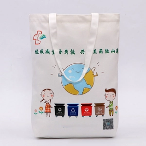 Detail showing high-quality canvas fabric texture and eco-themed cartoon print on tote bag