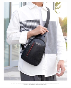 Detail of black PU leather chest bag with red stripe and metallic JINGPIN logo