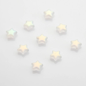 Detailed view of 10mm star-shaped crystal pendants in colorful shimmering white finish
