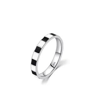 S925 sterling silver ring featuring a classic black and white checkered enamel pattern