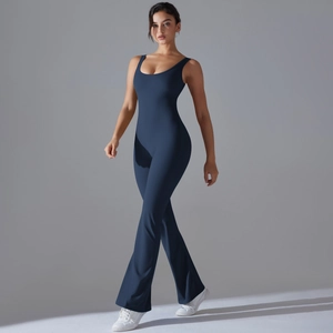 Slim fit dark blue yoga jumpsuit with flare legs and backless design for fitness