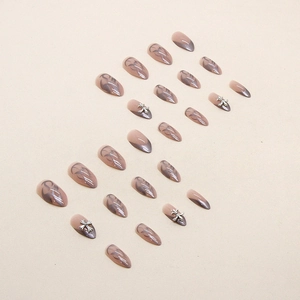 Aurora purple almond press-on nails with gothic silver crosses and tribal lines