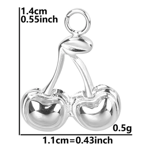 Detail of silver cherry pendant with size measurements 1.4cm by 1.1cm and weight 0.5g