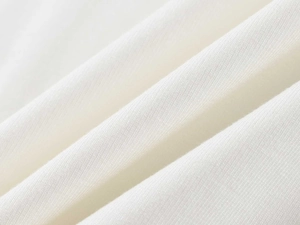 Close-up of white modal fabric texture showing breathable knit fibers and soft material