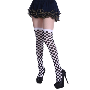Detail of thigh-high stockings with black and white checkerboard pattern and elastic top band