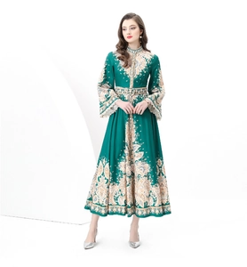 Detail of vintage palace style maxi dress featuring ethnic floral prints and stand collar