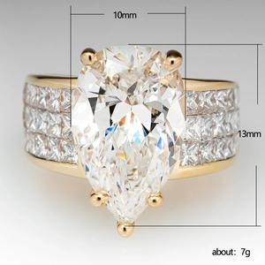 Gold pear-shaped zircon ring with micro-paved square stones and size dimensions