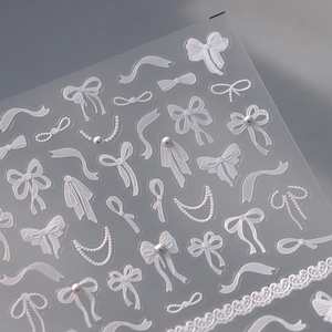 3D French iridescent bow and pearl nail art stickers with delicate lace patterns