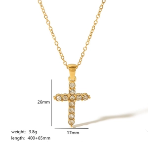 18k gold plated stainless steel cross necklace with sparkling round diamonds on white base