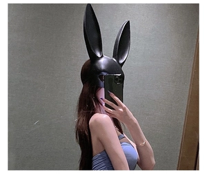 Close-up of black bunny ear mask with a glossy finish for costume parties and cosplay