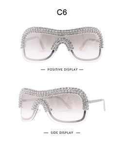 Front and side display of silver rhinestone wrap sunglasses with metallic punk frame
