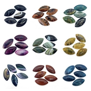 Detailed grid of oval natural stone cabochons in various colors and unique textures