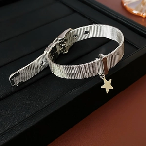 Detail of silver mesh bracelet with star pendant and adjustable buckle closure
