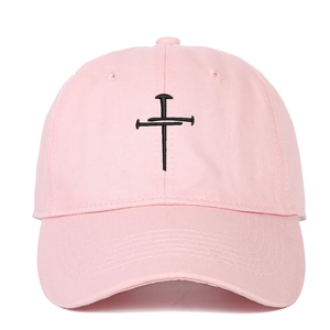 Pink cotton baseball cap featuring black cross embroidery on the front with a 6-panel design