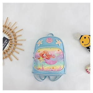 Close-up of glittery blue girl backpack with cartoon mermaid and shell decorations
