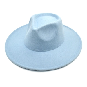 Detail shot of light blue wool fedora hat crown with center indentation and wide brim