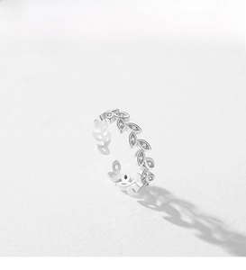 Macro view of S925 sterling silver leaf ring with micro-set zircon accents