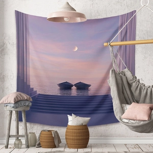 Detail of bohemian tapestry featuring a purple moonlit ocean scene on a textured wall