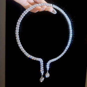 Detail of double-row pavé zircon choker necklace with geometric water drop pendants