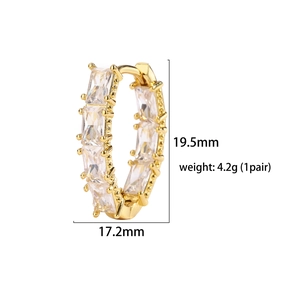 Macro detail showing 19.5mm height and 17.2mm width of gold-plated V-shaped zircon earrings