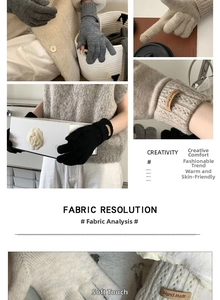 Detail of thick cashmere-feel knitted gloves with handcrafted leather label and soft texture