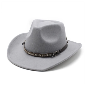Detail of western cowboy hat with ethnic patterned leather band and metal buckle accents