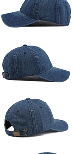 Detail view of washed denim baseball cap with adjustable metal buckle and stitching