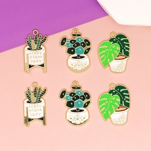 DIY enamel plant charms featuring cacti and monstera leaves for jewelry making