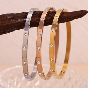 Minimalist 18K gold and silver stainless steel bangles with round zircon stones