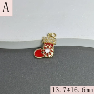 Detail of red enamel Christmas sock pendant with pearl and rhinestone snowflake