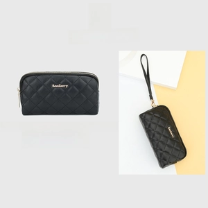 Women's black quilted long clutch wallet with wristlet strap and dual zippers