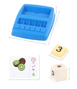 Educational matching game showing blue base, letter cubes, and kiwi fruit learning cards