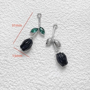 Macro view of alloy tulip pendant showing 31mm x 13mm dimensions for jewelry making